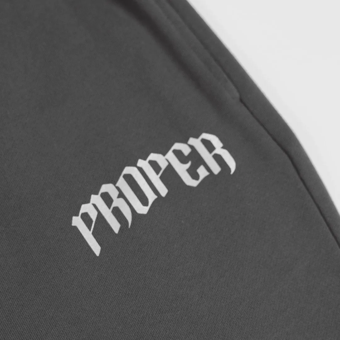 PROPER REFLECTIVE TRACKPANTS CHARCOAL